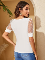 Damen Elegantes Oberteil mit transparenten Puffärmeln und Punkten R&B