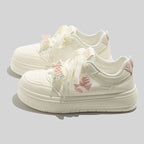 Damen Sneaker mit verspieltem Schleifenmotiv und bequemer Dämpfung