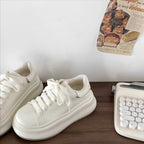 Damen Trendige Plateau-Sneaker mit eleganten Details