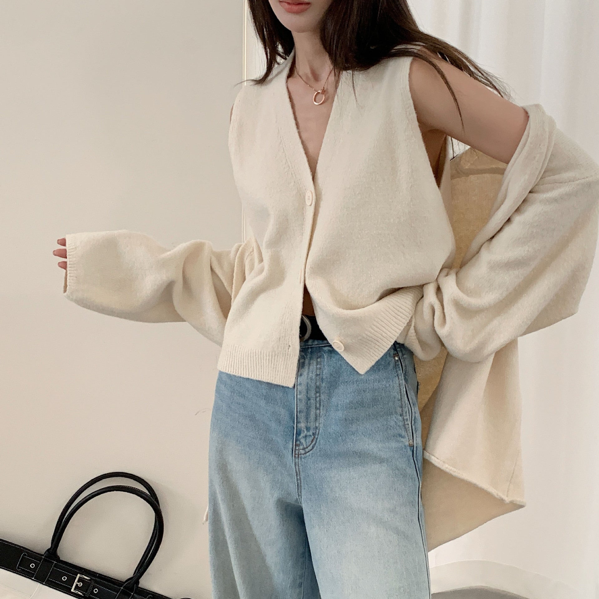 Damen Kuscheliger Strickcardigan mit großer Knopfleiste und Ballonärmeln