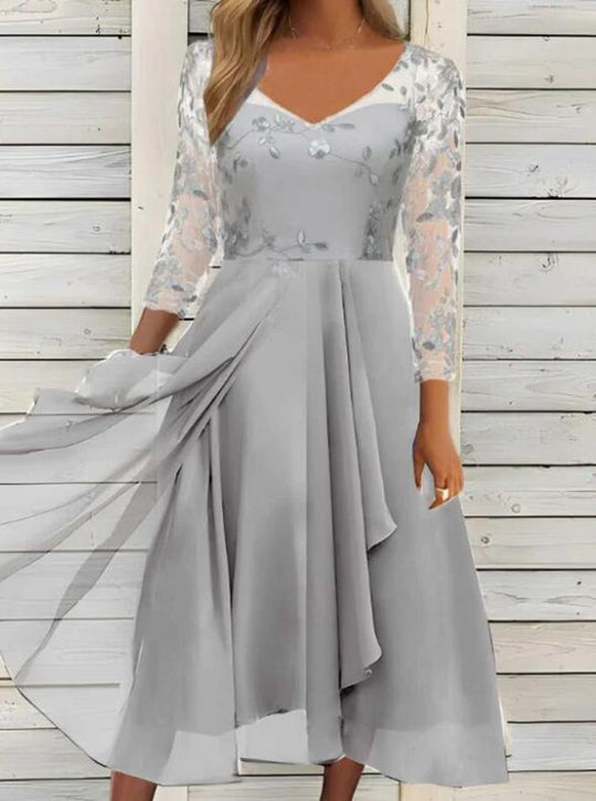 Damen Abendkleid mit floralen Spitzenärmeln und asymmetrischem Schnitt Heidi-Mode