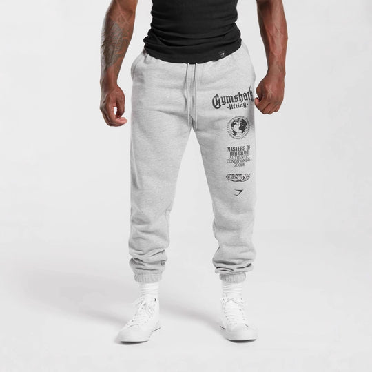 Herren nan konisch geschnittene Baumwollfleece-Sweathose mit elastischem Kordelbund gerippten Beinabschlüssen und großflächigem Logodruck R&B