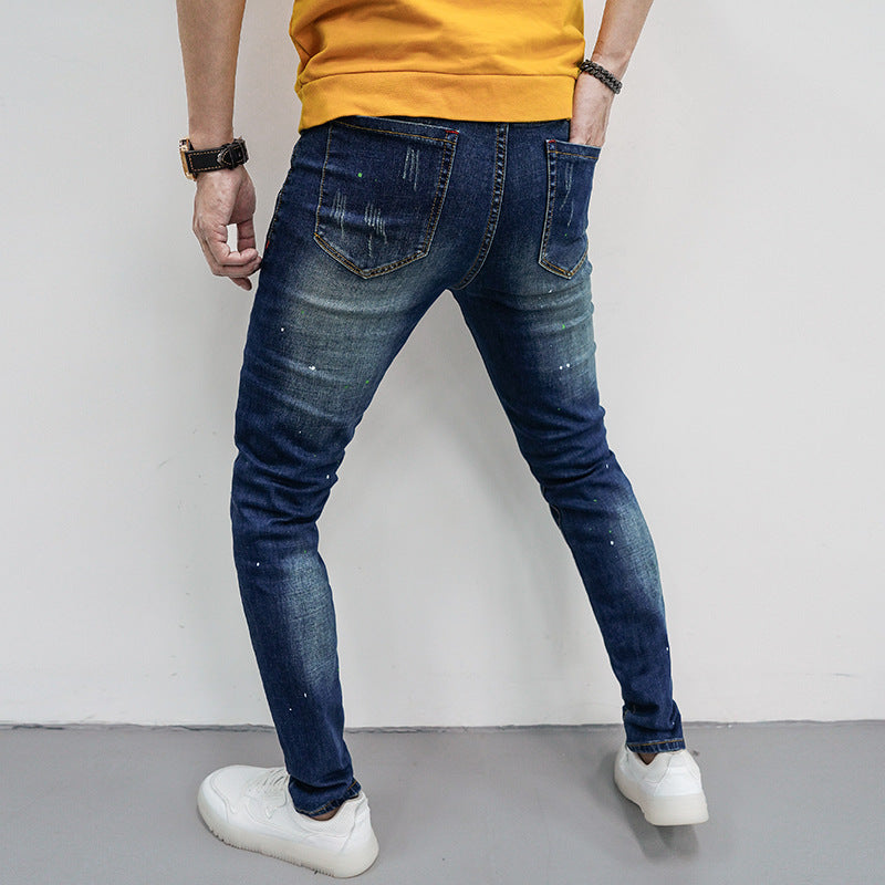 Herren Skinny Fit Jeans mit kreativen Farbklecksen und Rissdesign R&B