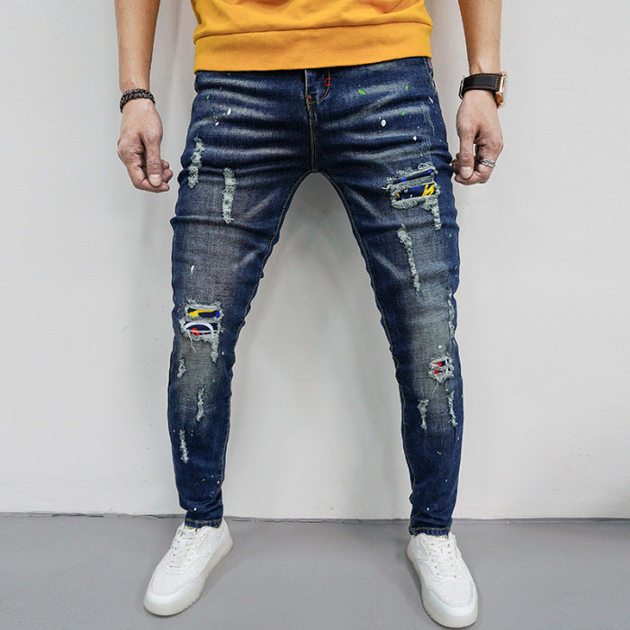 Herren Skinny Fit Jeans mit kreativen Farbklecksen und Rissdesign R&B