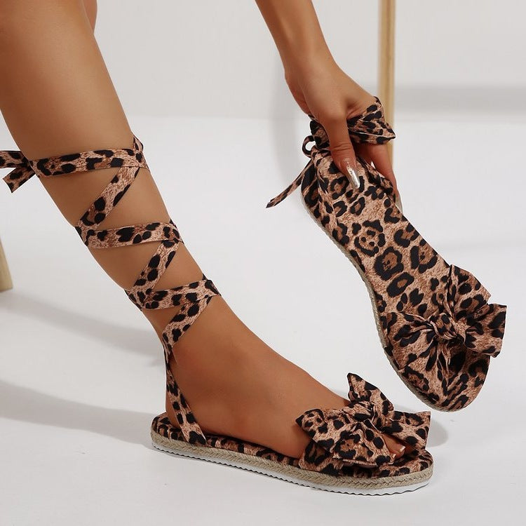 Damen Gladiator-Sandalen mit Blumendruck und Schleifenakzent R&B