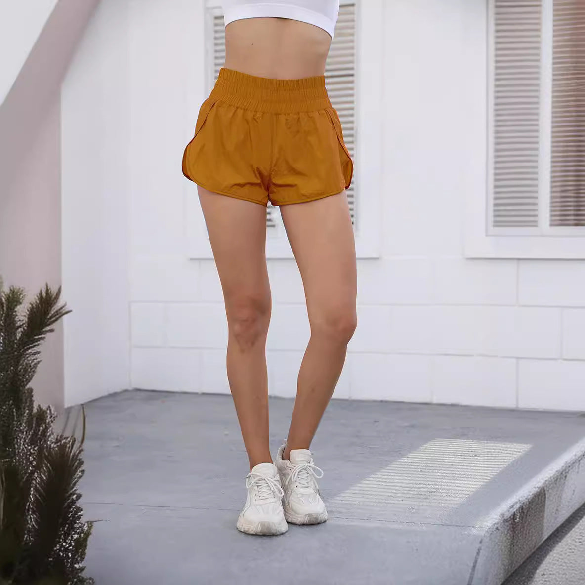Damen Sportliche Laufshorts mit elastischem Bund und seitlichen Taschen R&B