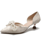 Damen elegant gestaltete Slingback-Pumps mit perlverziertem Schleifendetail