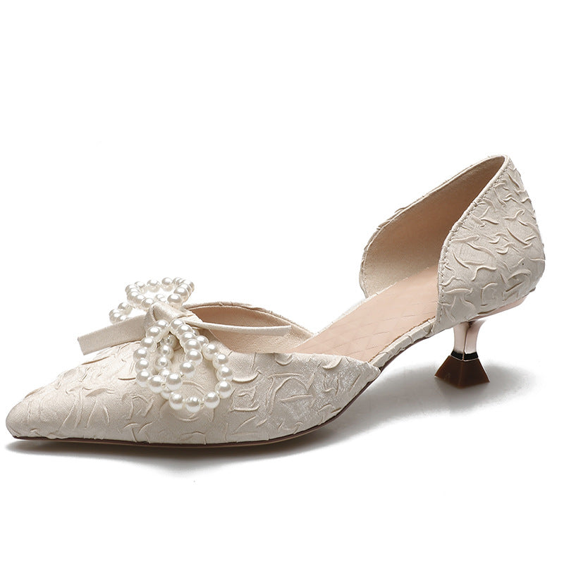 Damen elegant gestaltete Slingback-Pumps mit perlverziertem Schleifendetail