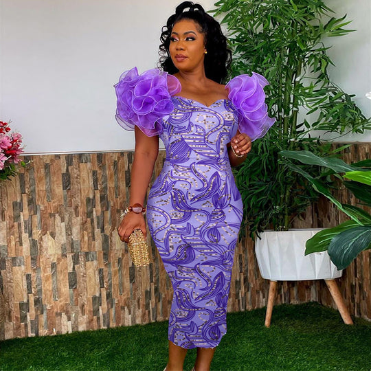 Damen Elegantes Midi-Kleid mit innovativen Puffärmeln und kunstvollem Druck R&B