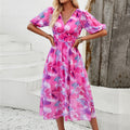 Damen Midikleid mit eleganten Puffärmeln und romantischem Blumenmuster R&B