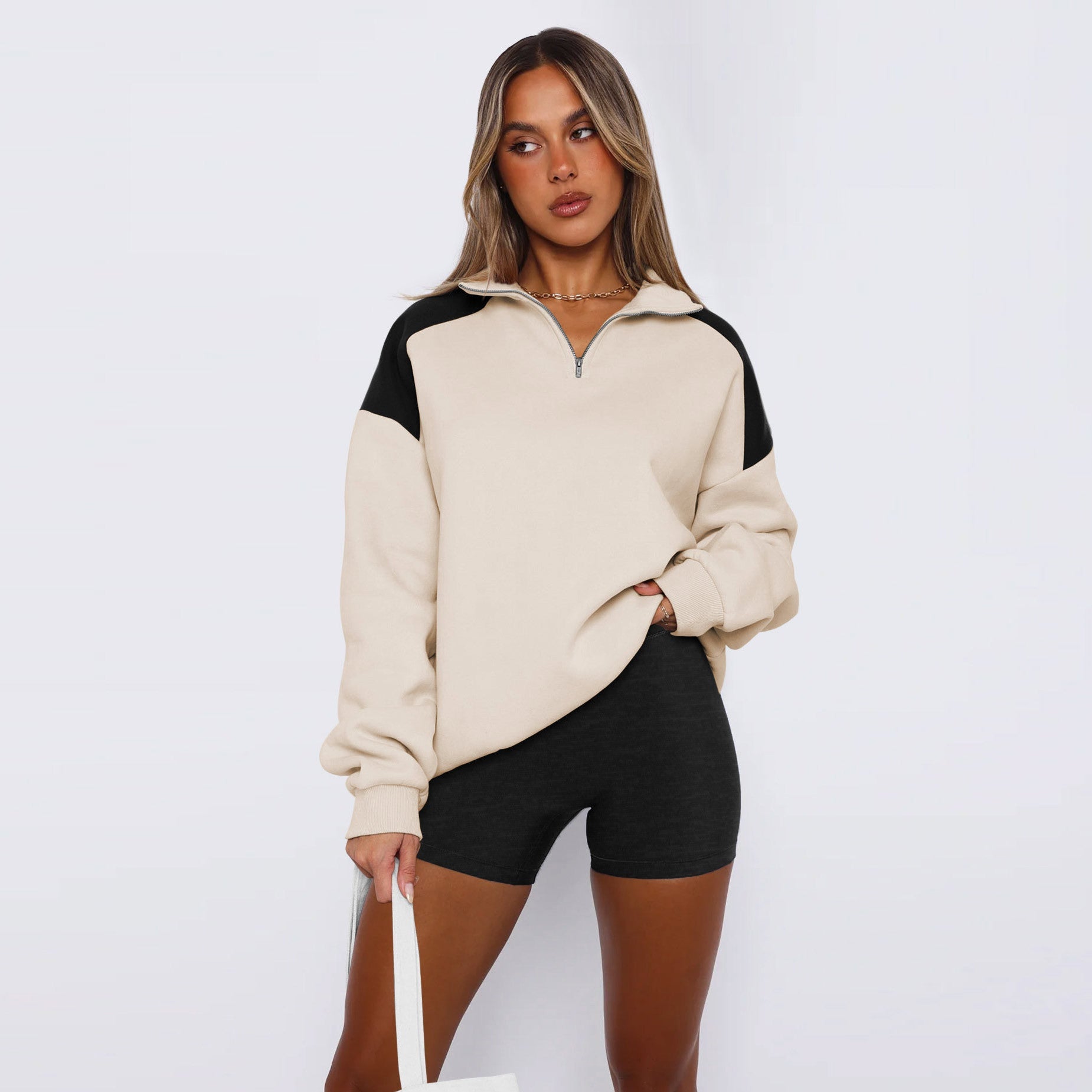 Damen lässiger Sweatshirt mit halbem Reißverschluss und kontrastierenden Ärmeln
