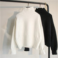 Damen Oversized Rollkragenpullover mit geschlitzten Ärmeln und Rippstruktur