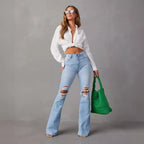 Damen Flared Jeans mit ausgefranstem Saum und verwaschenem Effekt R&B