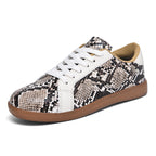 Damen Sportliche Sneakers mit elegantem Schlangenmuster