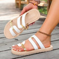 Damen Elegante und luftige Riemensandalen mit dekorativen Metallelementen R&B