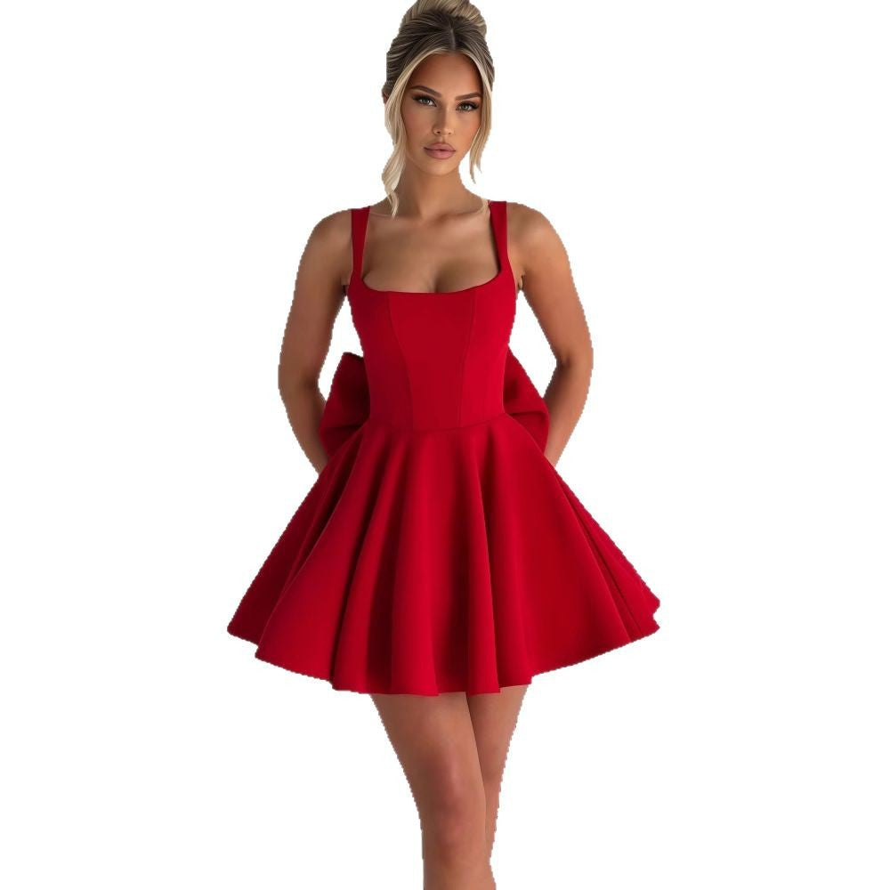 Damen Cocktailkleid mit oversized Schleifen-Design und fließendem Rock EB