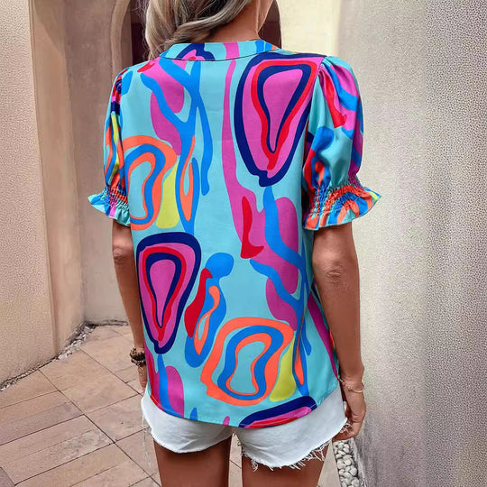 Damen Bluse mit kessen Puffärmeln und kreativem Grafikdesign R&B