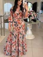 Damen Maxikleid mit buntem Blattmuster und tailliertem Gürtel