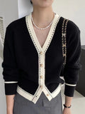 Damen Strickjacke mit kontrastierenden Details
