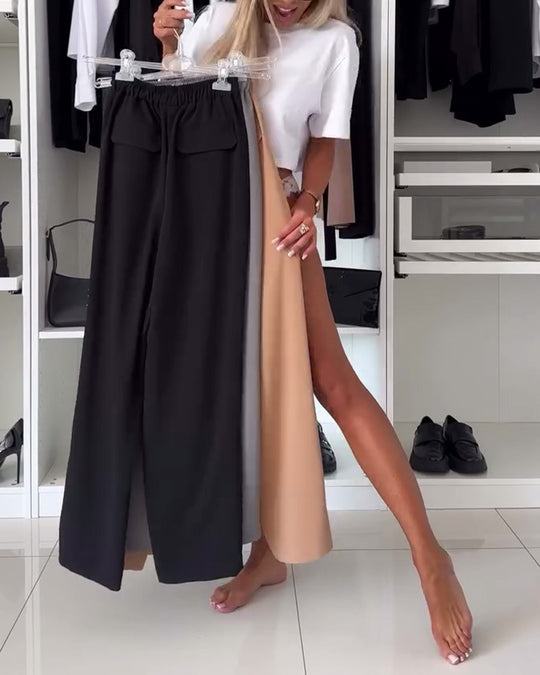 Damen Weit geschnittene Palazzo-Hose mit praktischen Seitentaschen und elastischem Bund Heidi-Mode