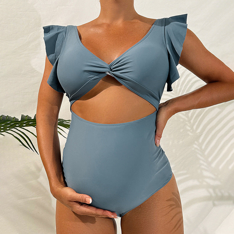 Damen Einteiler Badeanzug mit raffiniertem Wickeldetail und modischen Rüschenelementen R&B