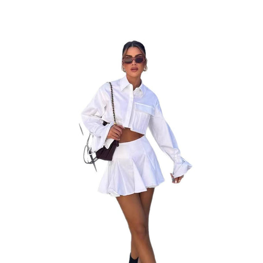 Damen modisches kurzämliges Set aus fließendem Material mit cropped Bluse und weit schwingendem Rock R&B
