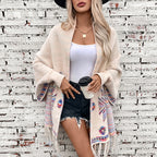 Damen Strickponcho mit buntem Navajo-Muster und fransigem Saum