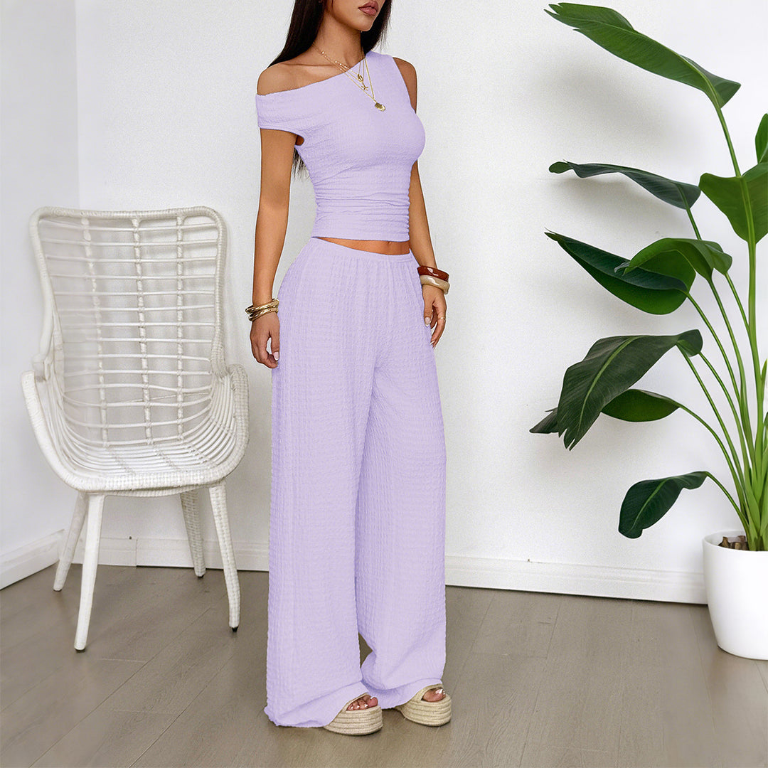 Damen Zweiteiliges Set aus elastischem Rippstoff mit asymmetrischem Top und weitem Hosen R&B