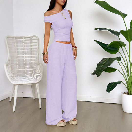 Damen Zweiteiliges Set aus elastischem Rippstoff mit asymmetrischem Top und weitem Hosen R&B