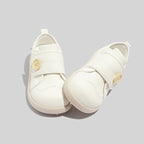 Damen Sneakers mit innovativem Knopfvorschluss und atmungsaktiven Eigenschaften