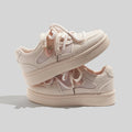 Damen Sneakers mit atmungsaktiven Mesh-Einsätzen und dekorativen Details