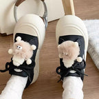 Damen Sneakers mit modischen Pompon-Applikationen und bequemer Sohle