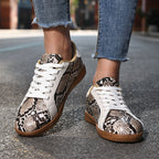 Damen Sportliche Sneakers mit elegantem Schlangenmuster