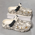 Damen Komfortable Clogs mit verstellbarem Riemen und floralem Design