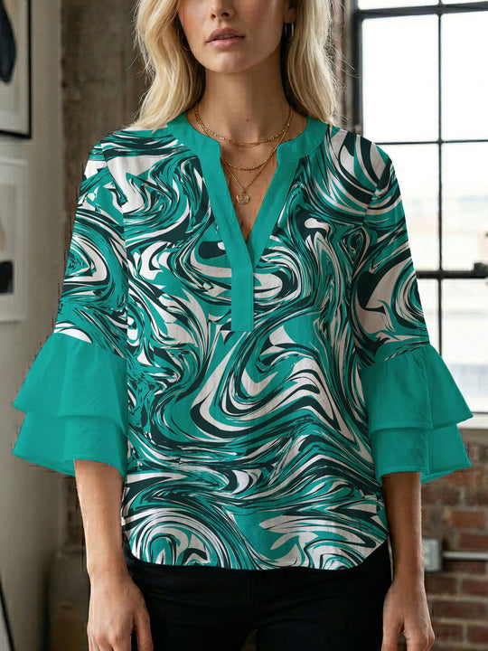 Damen Bluse mit voluminösen Flügelärmel und intensivem Blattmuster R&B
