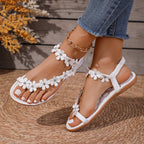 Damen Zehenstegsandalen mit floralen Applikationen und rutschfester Sohle R&B