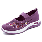 Damen Sportliche Slip-On Sneakers mit floralem Stickdesign