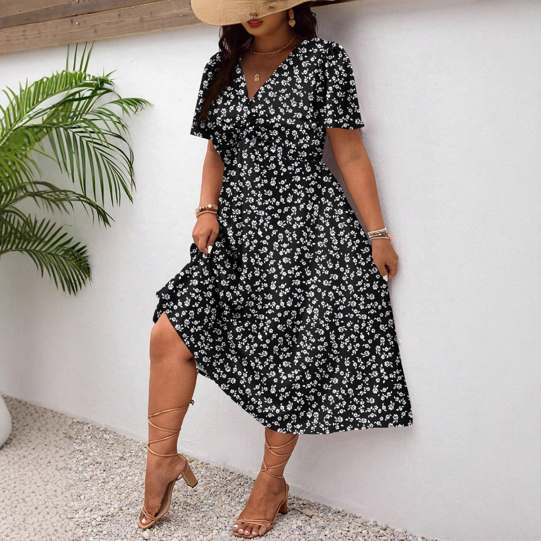 Damen Midi-Kleid mit Blumenmuster und vorteilhaftem Schlitz R&B