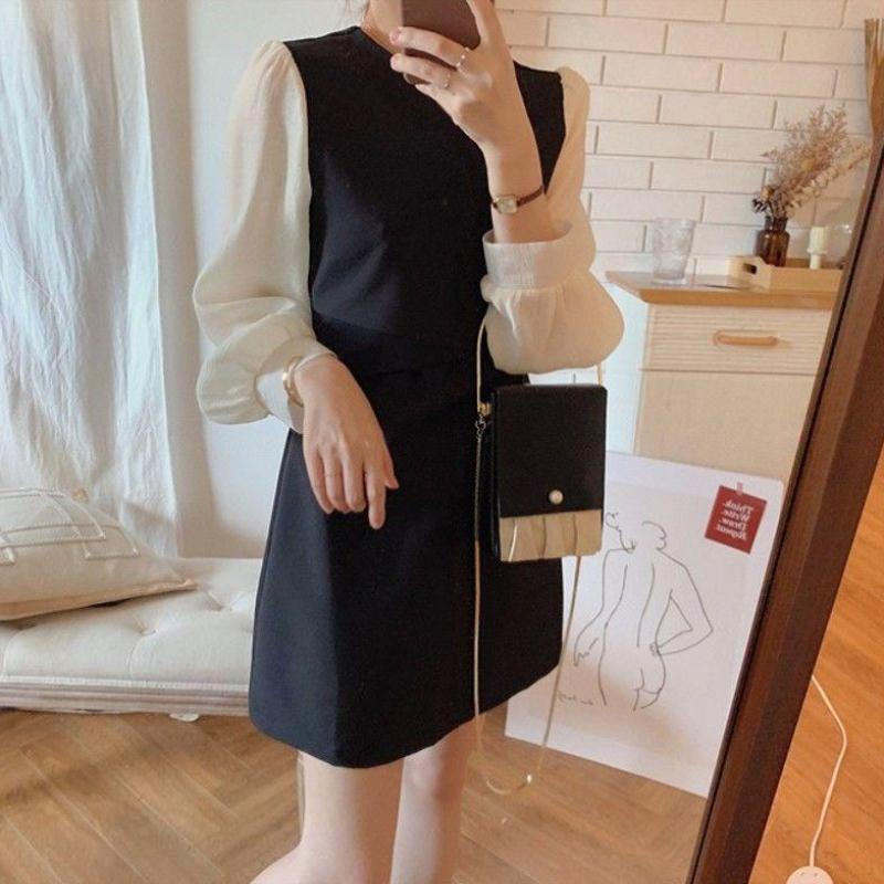 Damen Kleid mit stylischen Puffärmeln und eleganter Taillierung