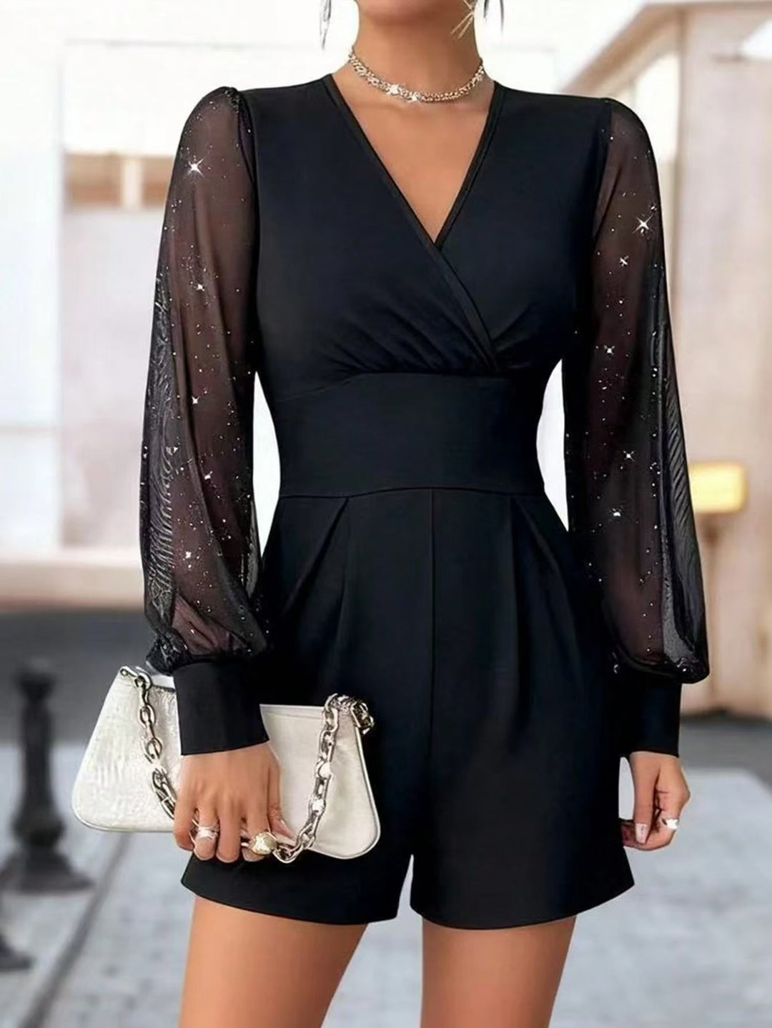 Damen eleganter Jumpsuit mit transparenten Puffärmeln und V-Ausschnitt R&B