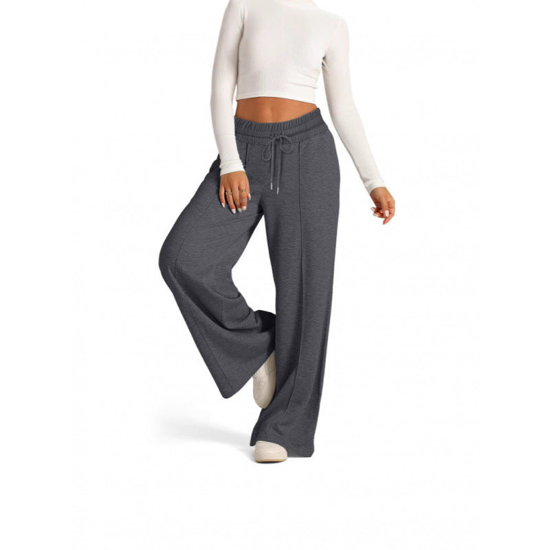 Damen breite Jogginghose mit elastischem Bund und seitlichen Eingrifftaschen
