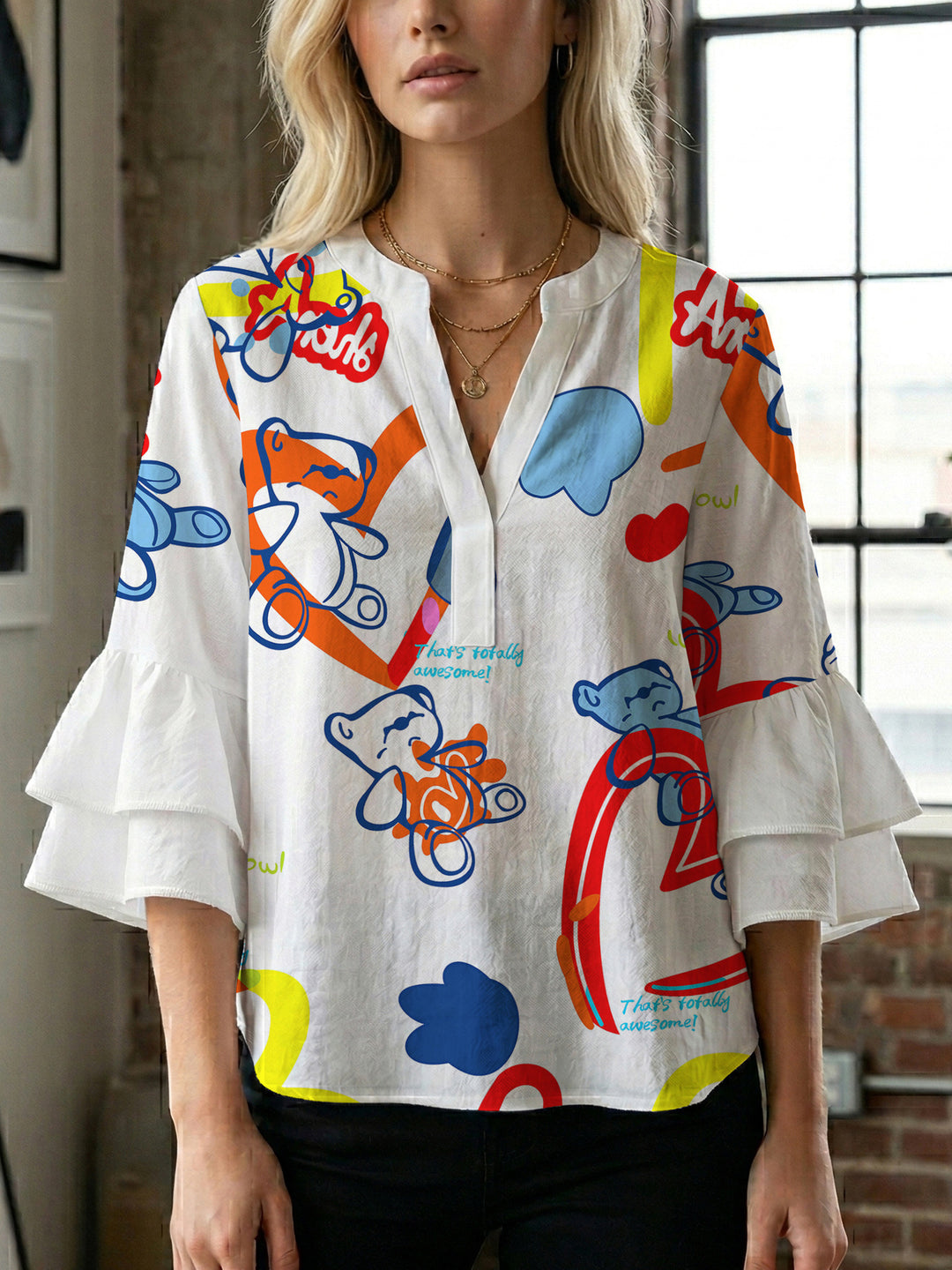 Damen Bluse mit voluminösen Rüschenärmeln und modernem Motiv R&B