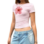 Damen Figurbetontes Kurzarmshirt mit lR&Bhaftem Hibiskus-Motiv R&B
