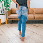 Damen High-Waist Jeanshose mit Knopf-Detail und modischem Fransenabschluss R&B