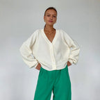 Damen kuschelige Strickjacke mit umschlagbaren Ärmeln und modischen Knopfdetails R&B
