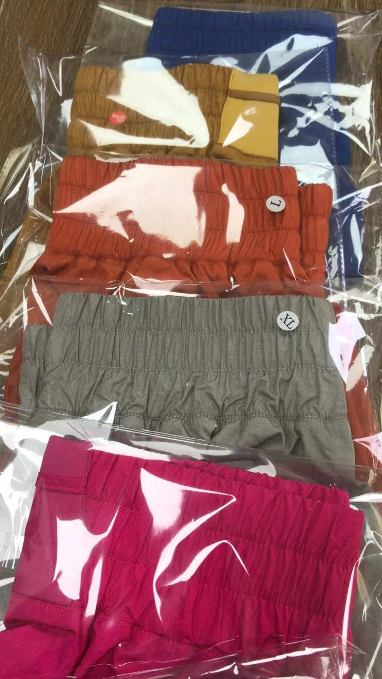 Damen Sportliche Laufshorts mit elastischem Bund und seitlichen Taschen R&B