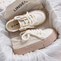 Damen Sneakers mit dickem Profil und innovativen Schnürdetails