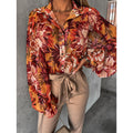 Damen Bluse mit floralem Druck und Glockenärmeln