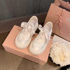 Damen Sneaker mit dekorativen Schleifen und hochwertiger Oberflächenstruktur