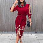 Damen Midikleid mit floralen Details und eleganten Schlitz R&B